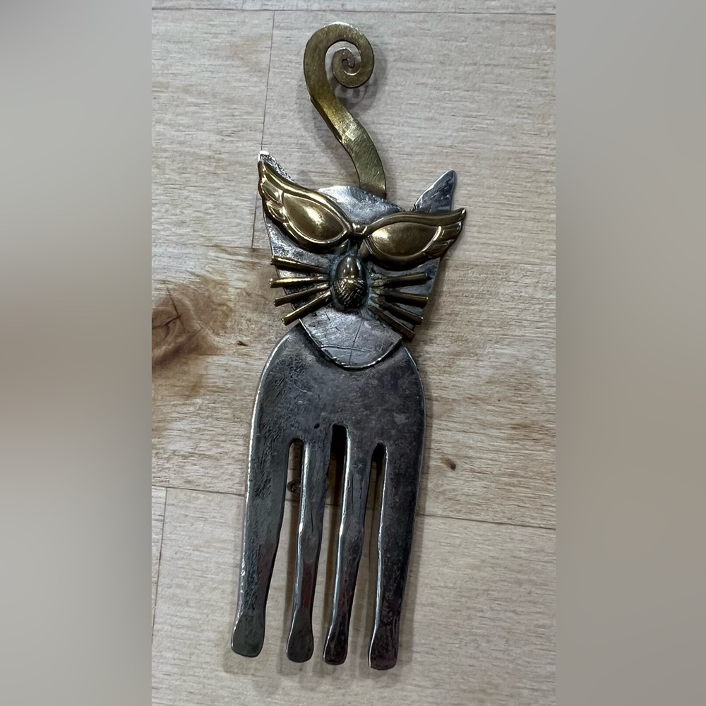 Boho silver cat brooch.